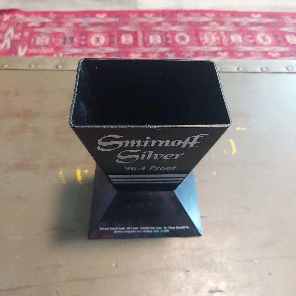 Vintage 1978 Smirnoff Silver 90.4 Proof Vodka Plastic Bottle Display Stand Black